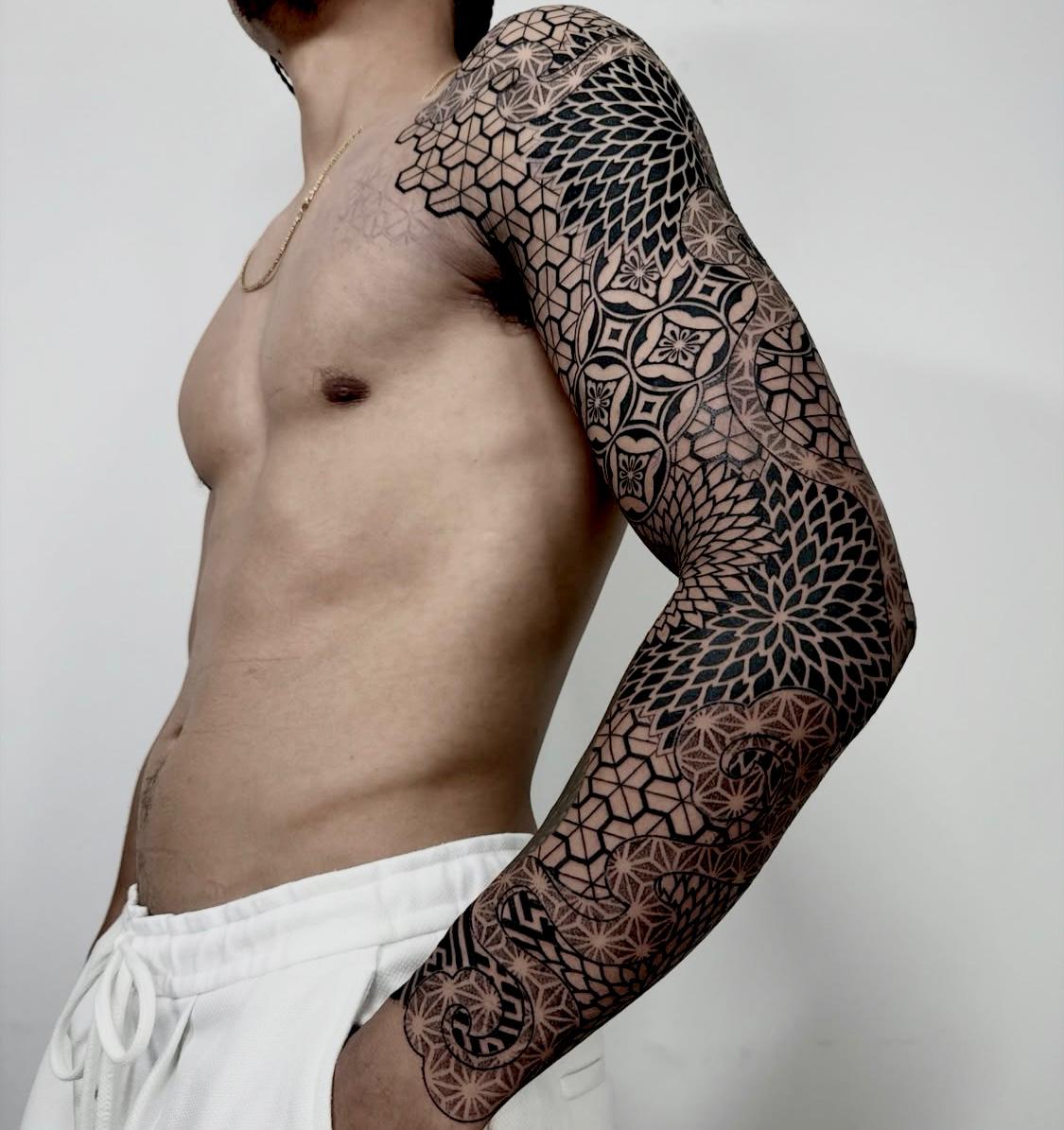 Geometric tattoo by Dezső Jakab
